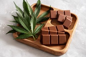 chocolate-bars-on-wooden-tray-with-cannabis-leaves-2025-03-10-01-20-55-utc-1024x683